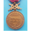 Zlatá záslužná služební medaile NSG za XXX. let služby 1945-1949 s meči