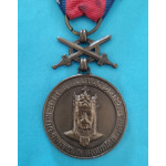 Bronzová medaile krále Karla IV. „ Za věrné služby “ 1918-19 s meči pro vojenské osoby s podpisem OP - 1.typ